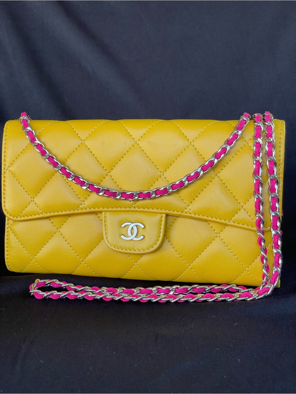 AUTH. Chanel Flap trifold wallet with silver tone hardware.